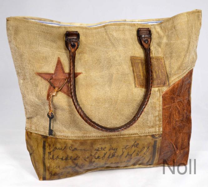 14257b73ca32c880 Handtasche Canvas mit Lederapplikationen Stern